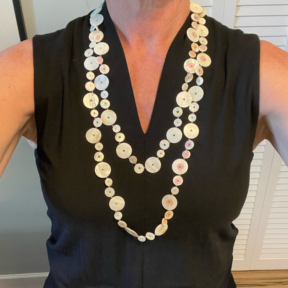Unique circular white shells and sequins necklace, 36 inches long.
